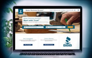 Hot to submit your business to the BBB with BBB homepage mockup on a laptop screen.