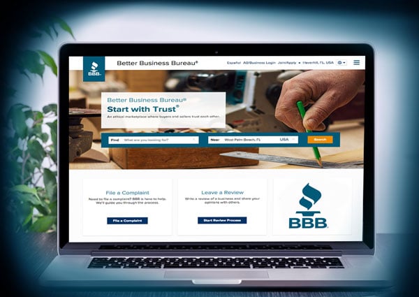 Hot to submit your business to the BBB with BBB homepage mockup on a laptop screen.